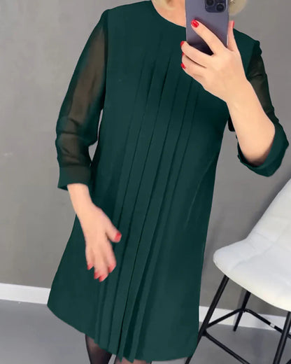 Pleated dress in knitted fabric