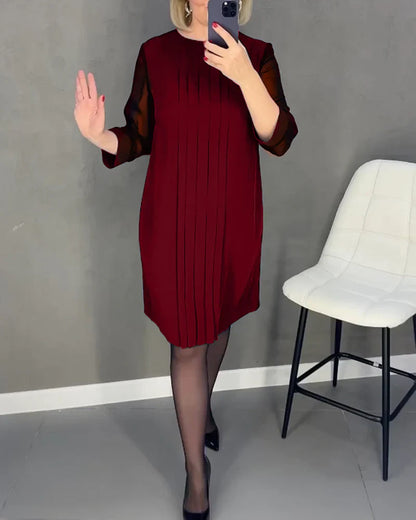 Pleated dress in knitted fabric