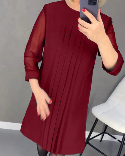 Pleated dress in knitted fabric