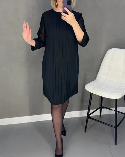 Pleated dress in knitted fabric