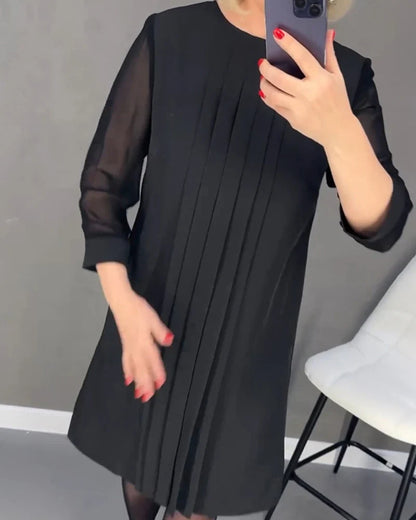 Pleated dress in knitted fabric
