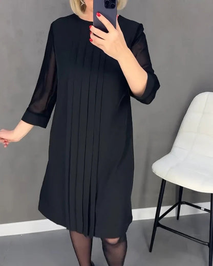 Pleated dress in knitted fabric