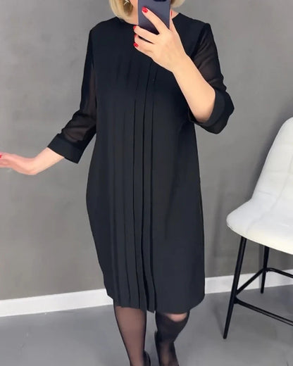 Pleated dress in knitted fabric