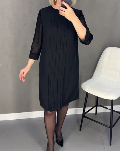 Pleated dress in knitted fabric
