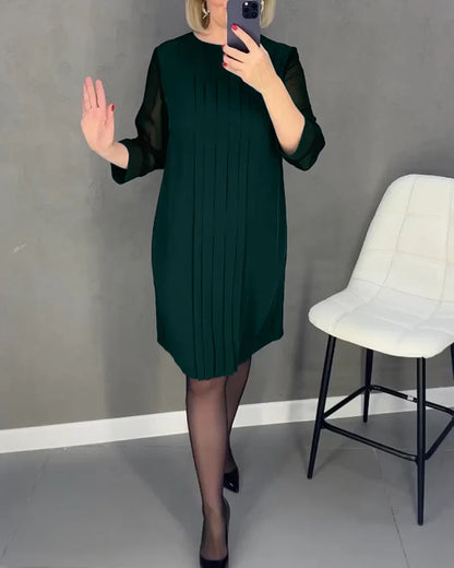 Pleated dress in knitted fabric